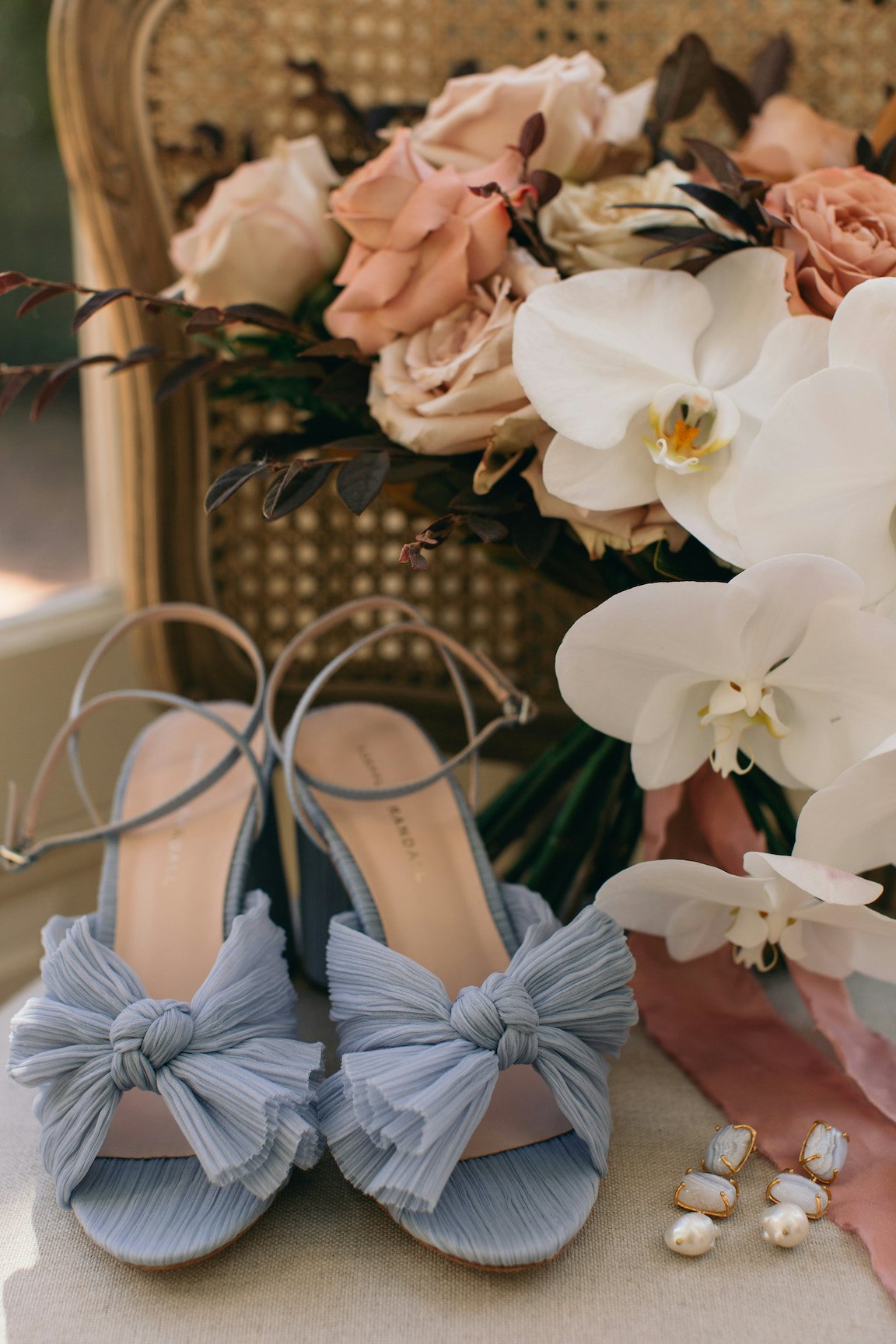 Bridal shoes with bouquet 