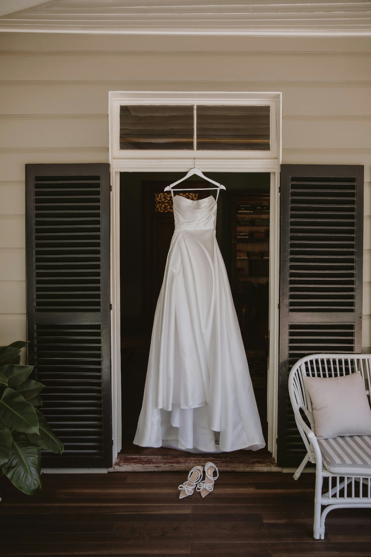 Hanging dress with wedding shoes 