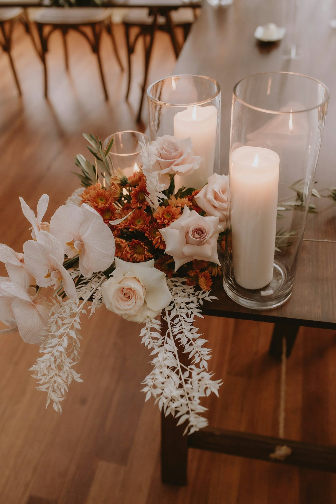 Wedding vases and flowers on tables 
