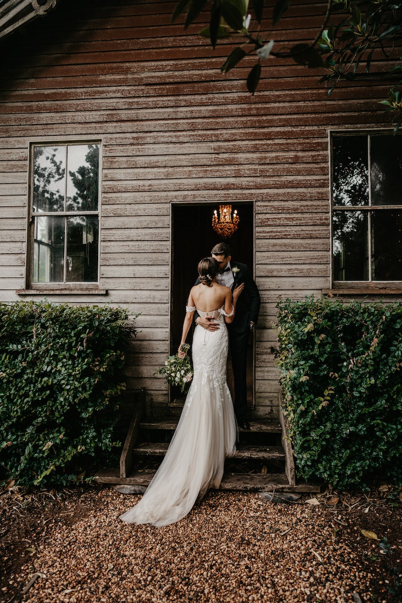 Bride and groom in old school house
