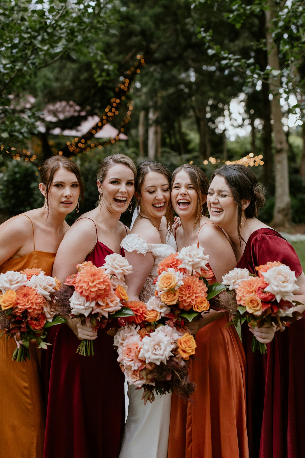 Bride and Bridesmaid holding bouquets