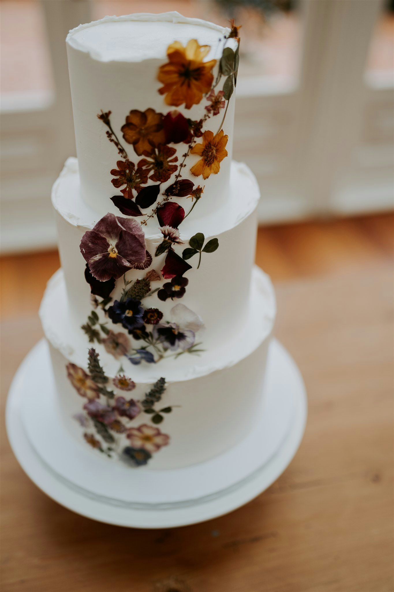 Wedding cake with pressed flowers