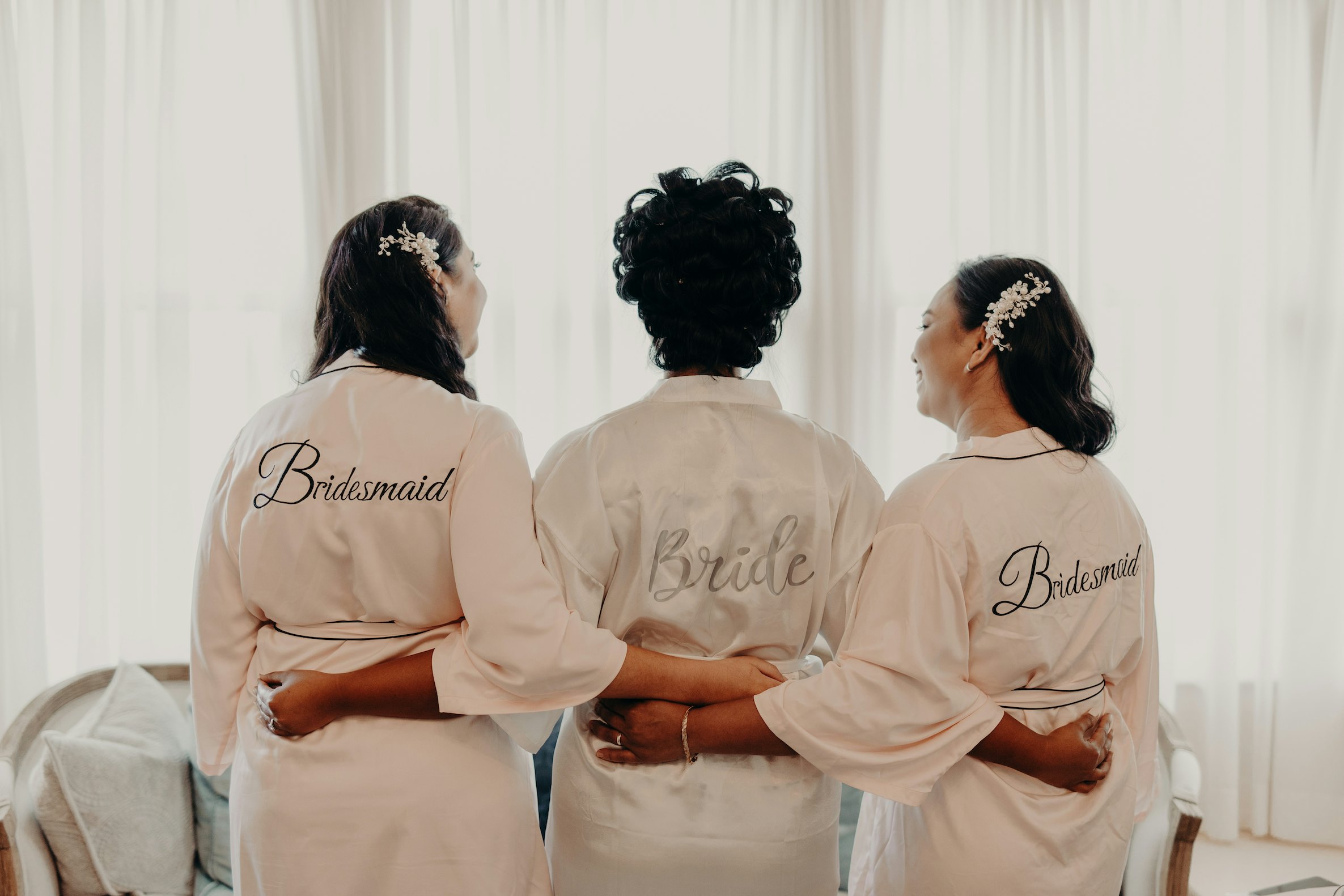 Bride and bridesmaids wearing dressing gowns