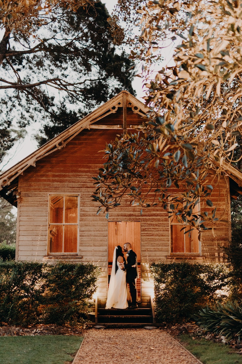 Bride and groom in old school house