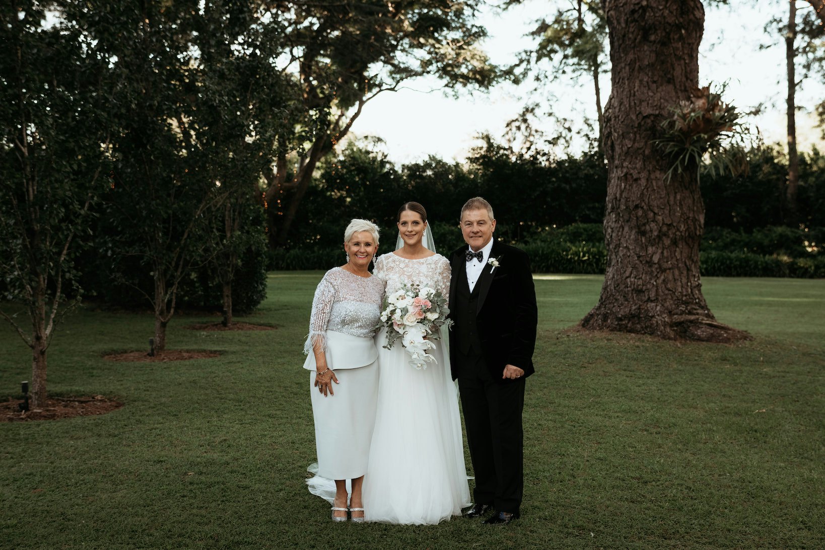Bride with her mother and father