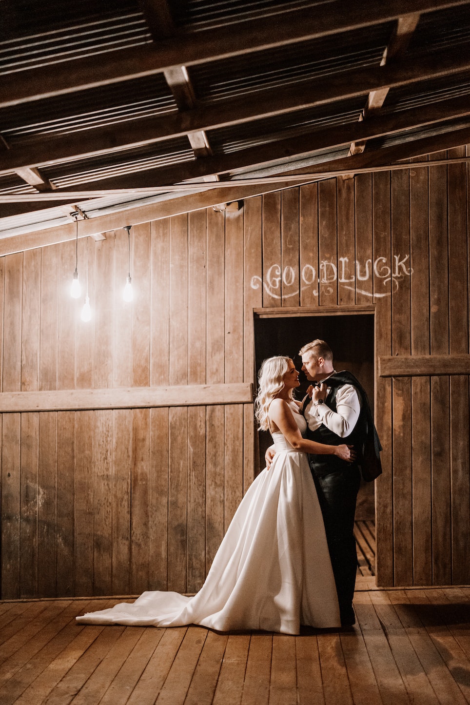 Bride and groom in stables