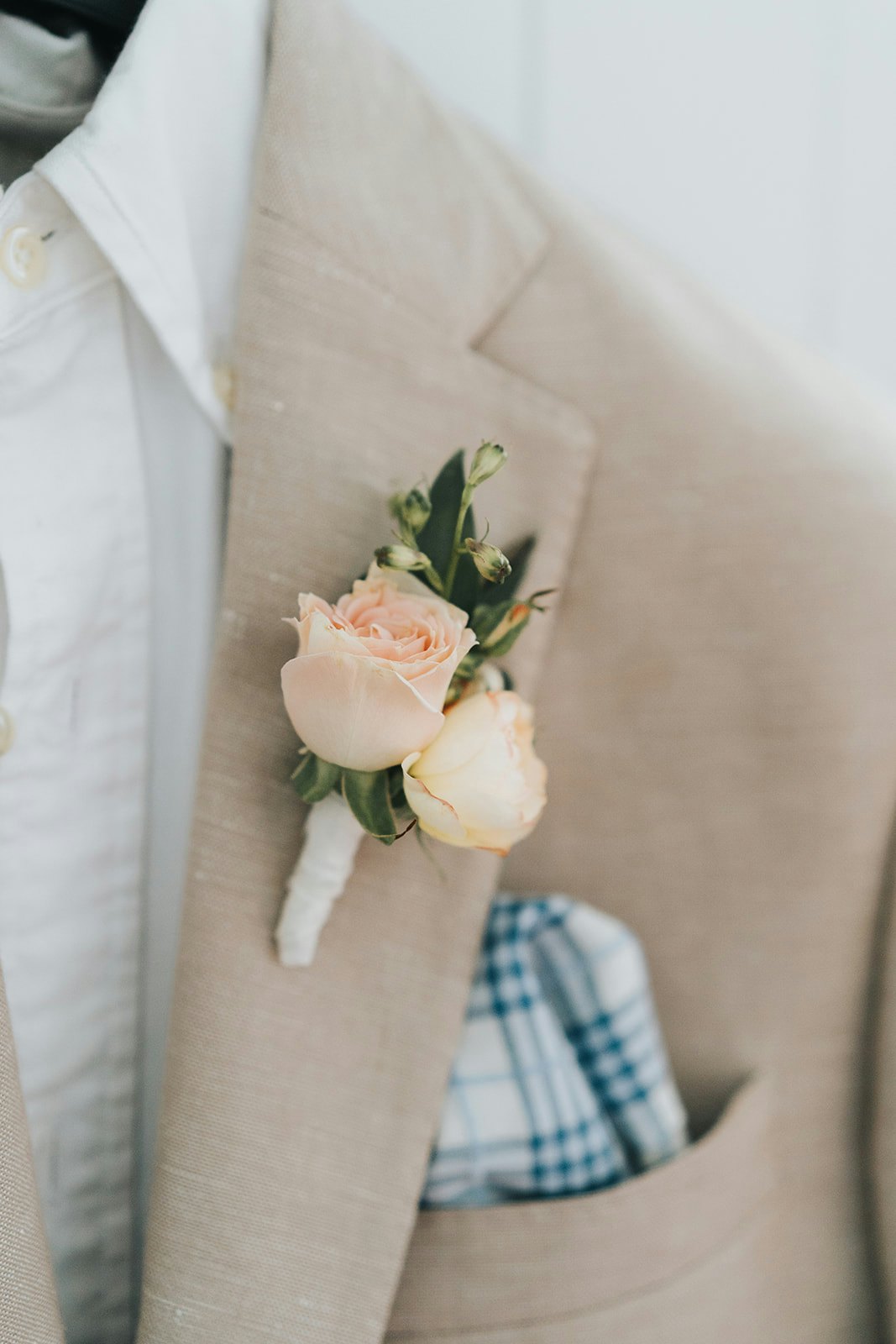 Grooms jacket with boutonniere