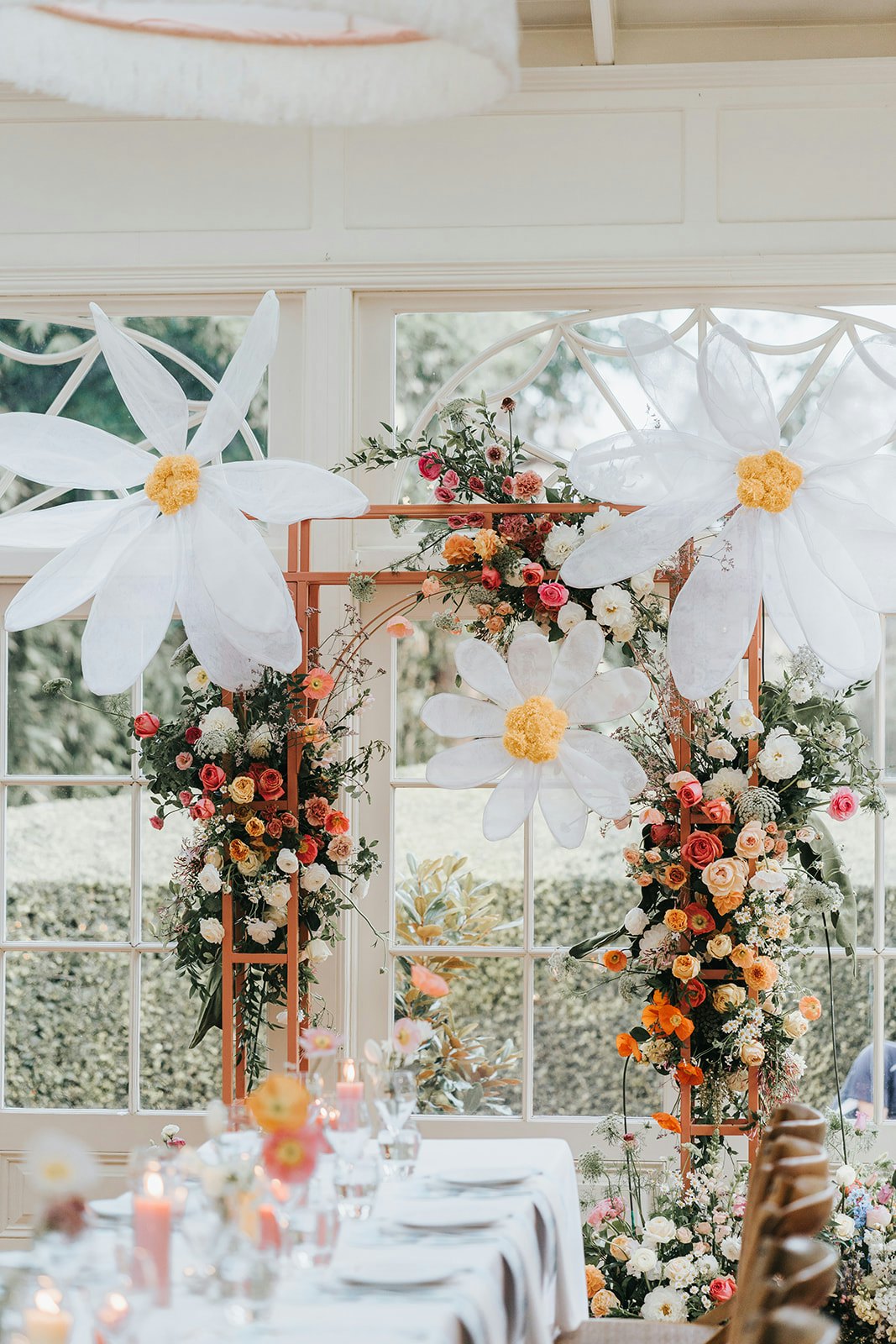 Flowers and arbour in wedding reception