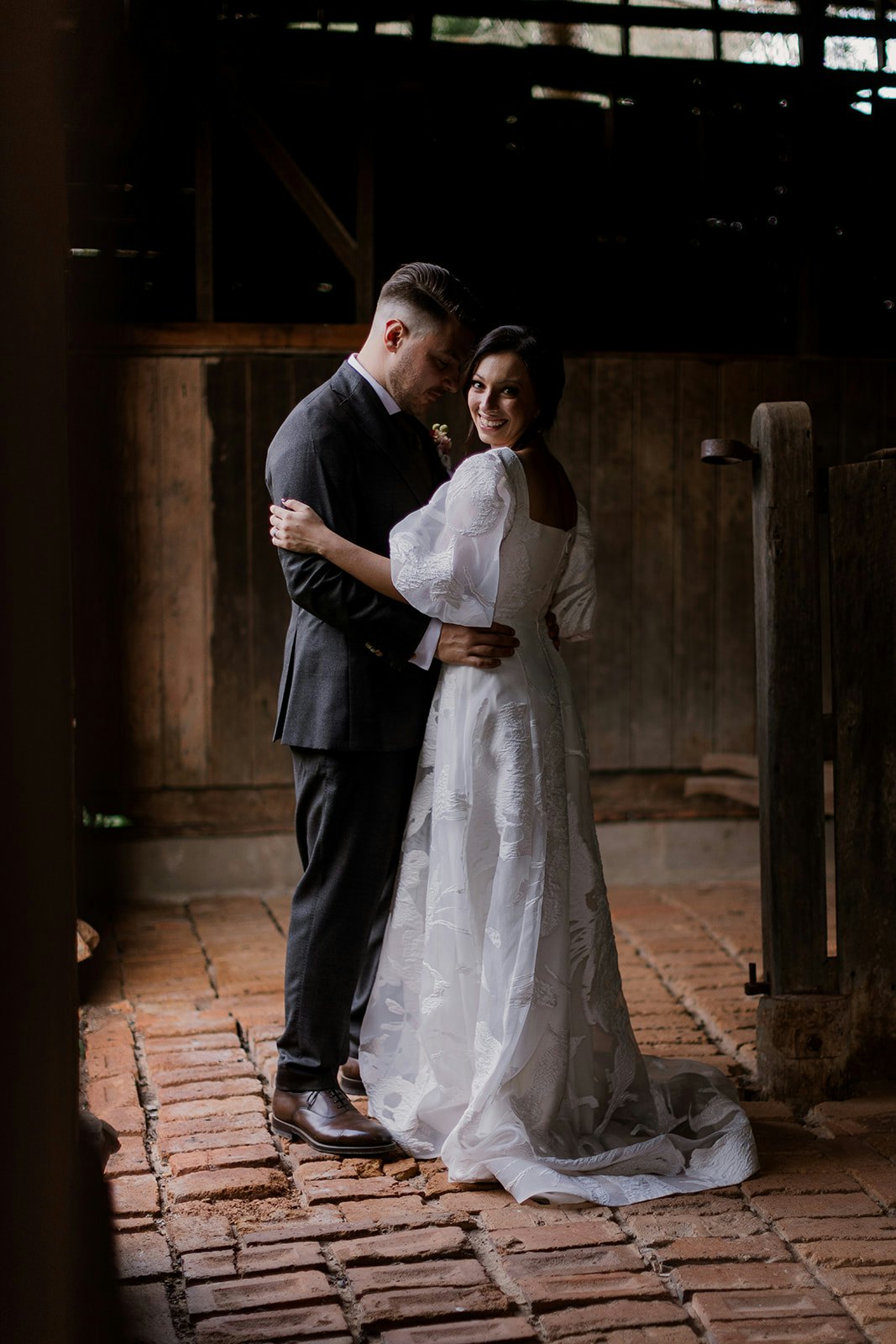 Bride and groom in the stables