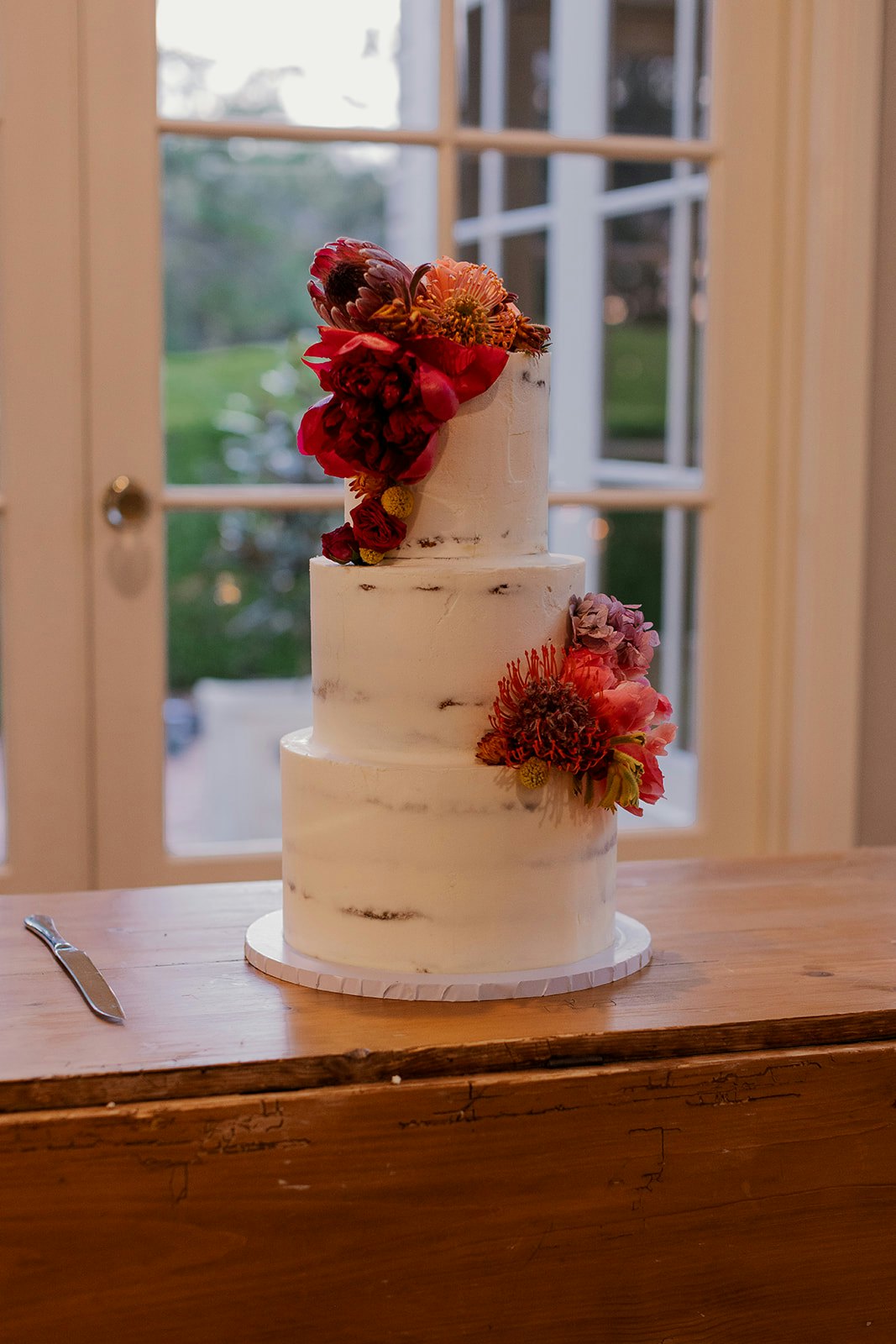 Wedding cake with flowers on it