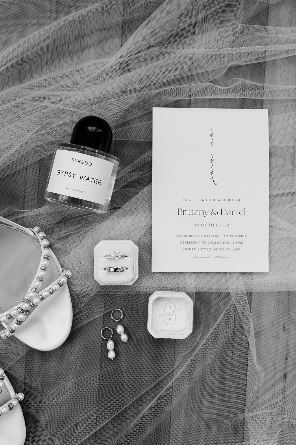 Wedding shoes and invitation