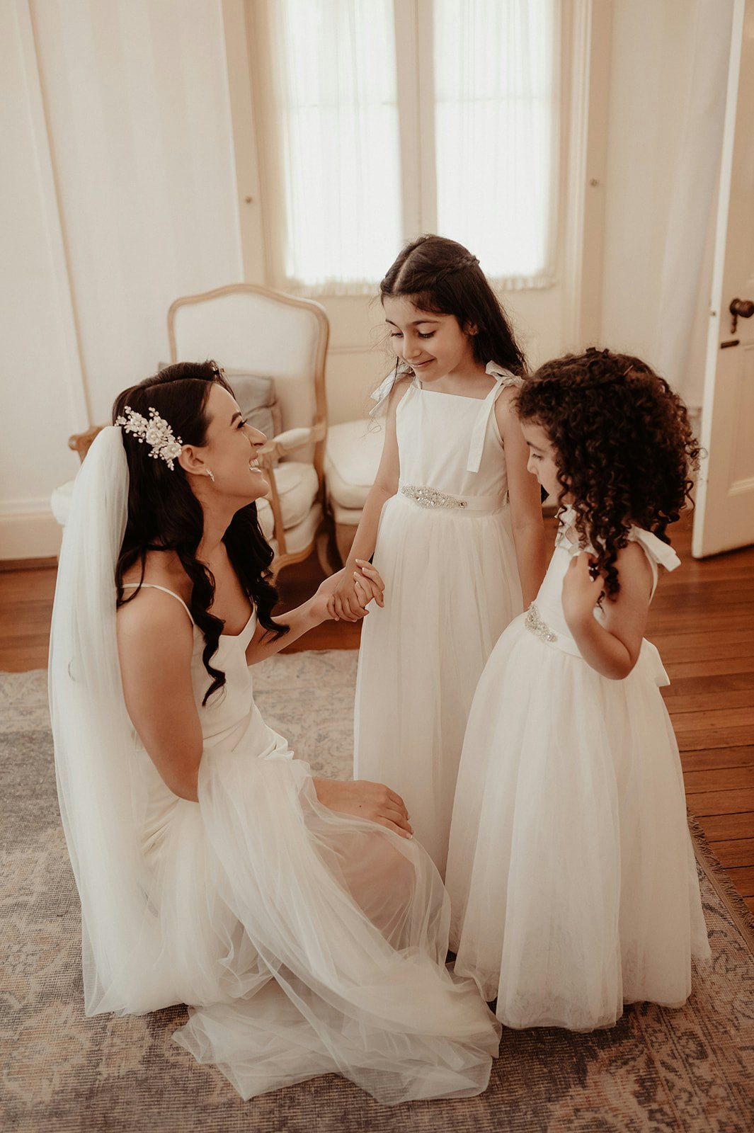 Bride with flower girls