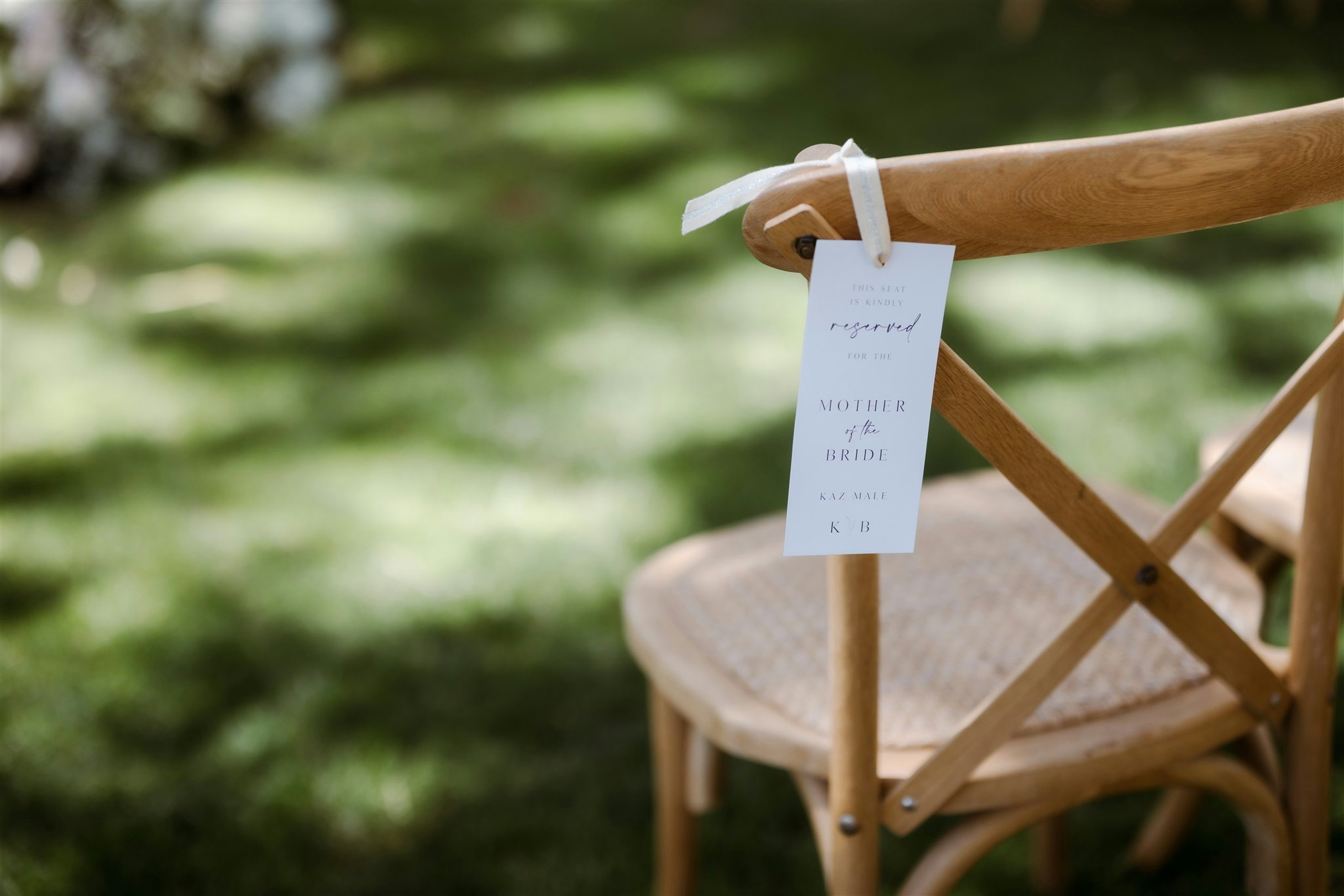 Ceremony chair with reserved sign