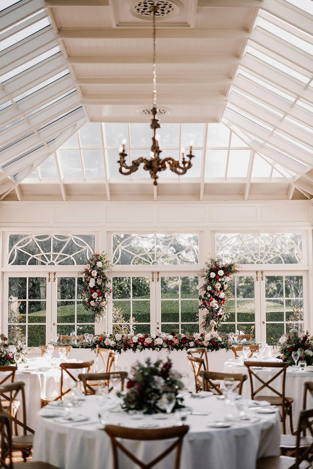 Wedding reception with round tables and flowers