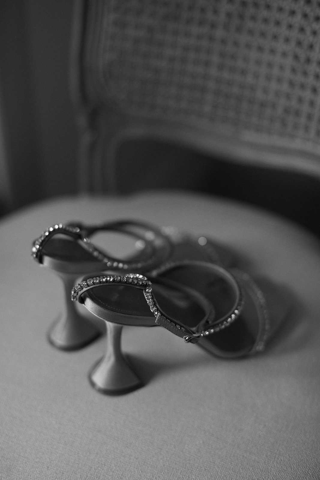 Brides shoes sitting on chair