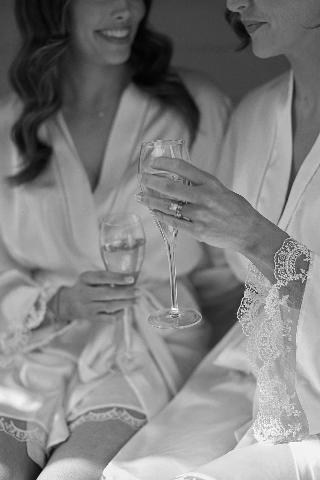 Ladies holding champagne glasses
