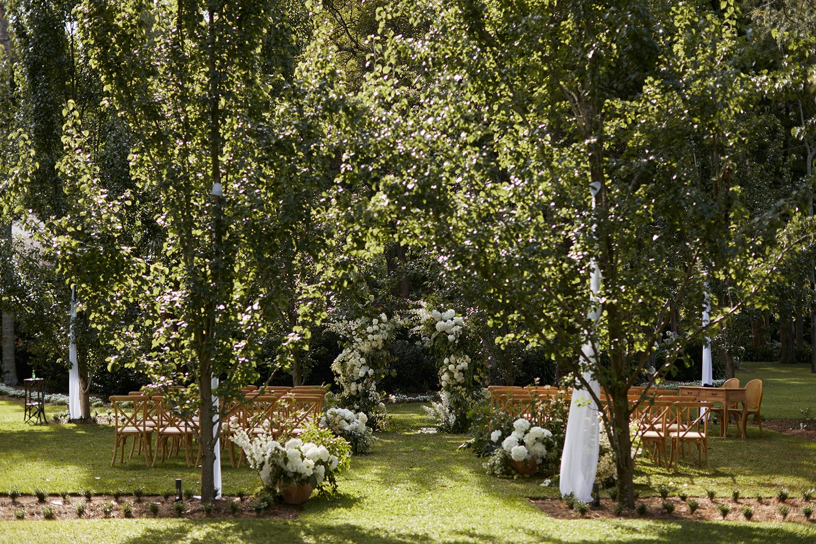 Wedding ceremony under trees