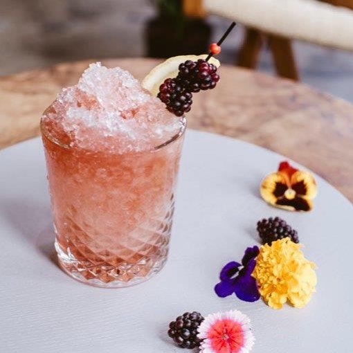 Cocktail with edible flowers