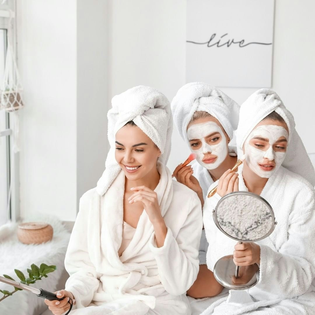 Bride and bridesmaids putting on facemask