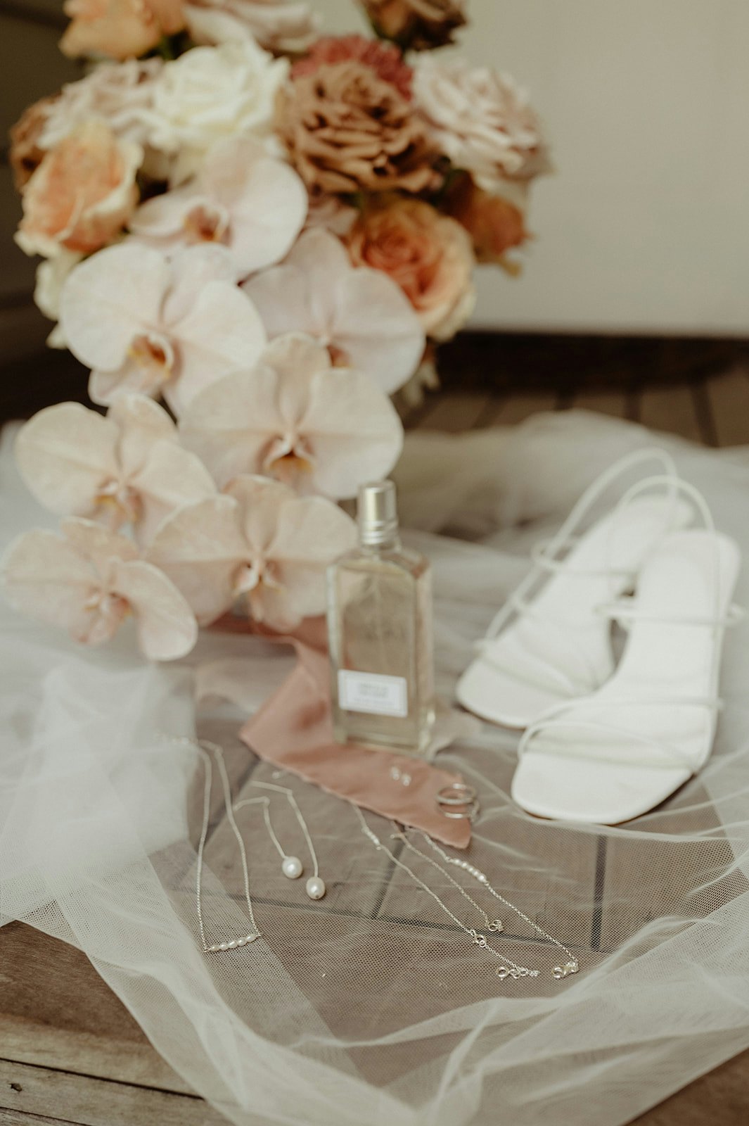 Wedding shoes, flowers and perfume