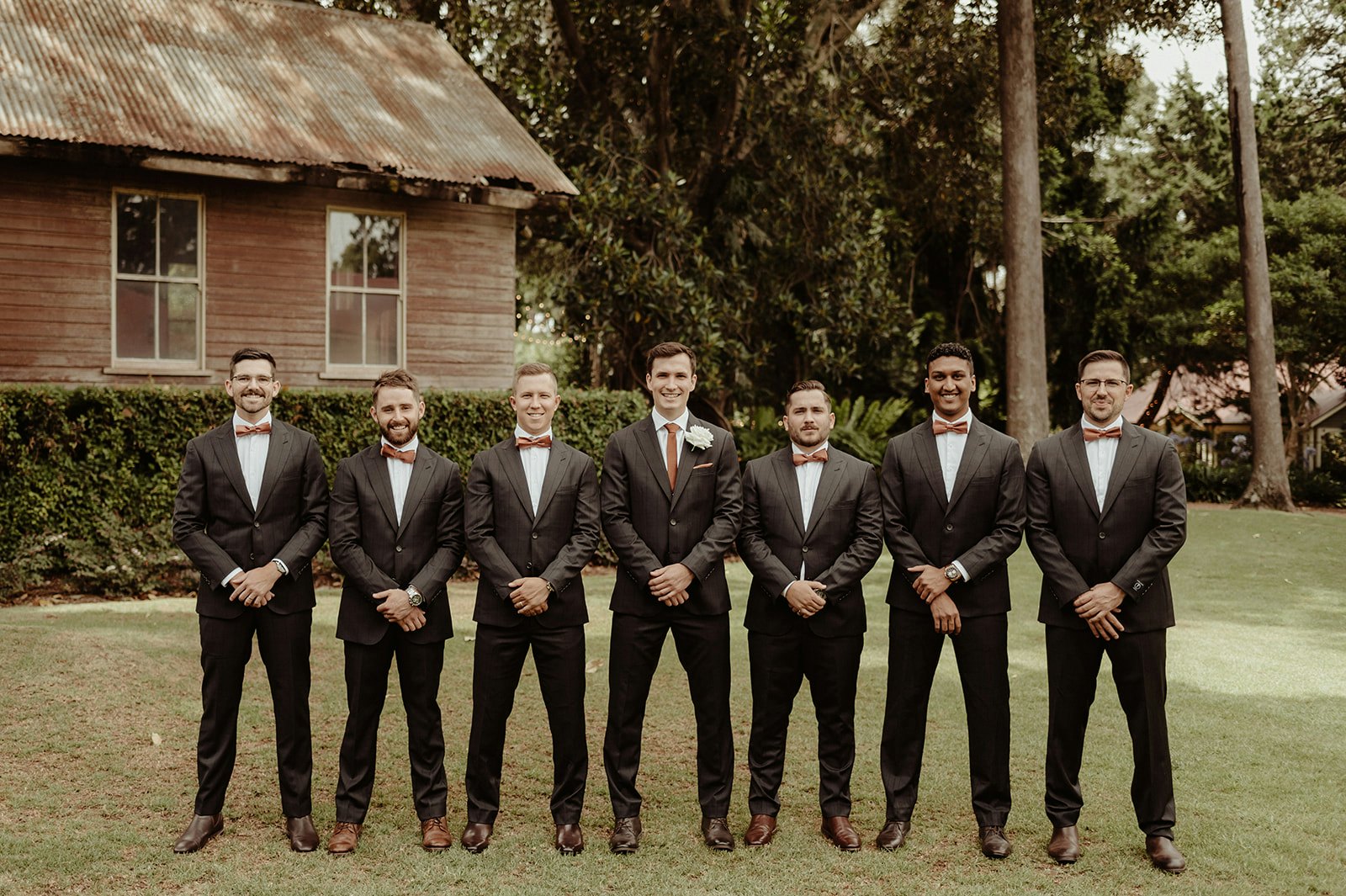 Groom and groomsmen in wedding suits