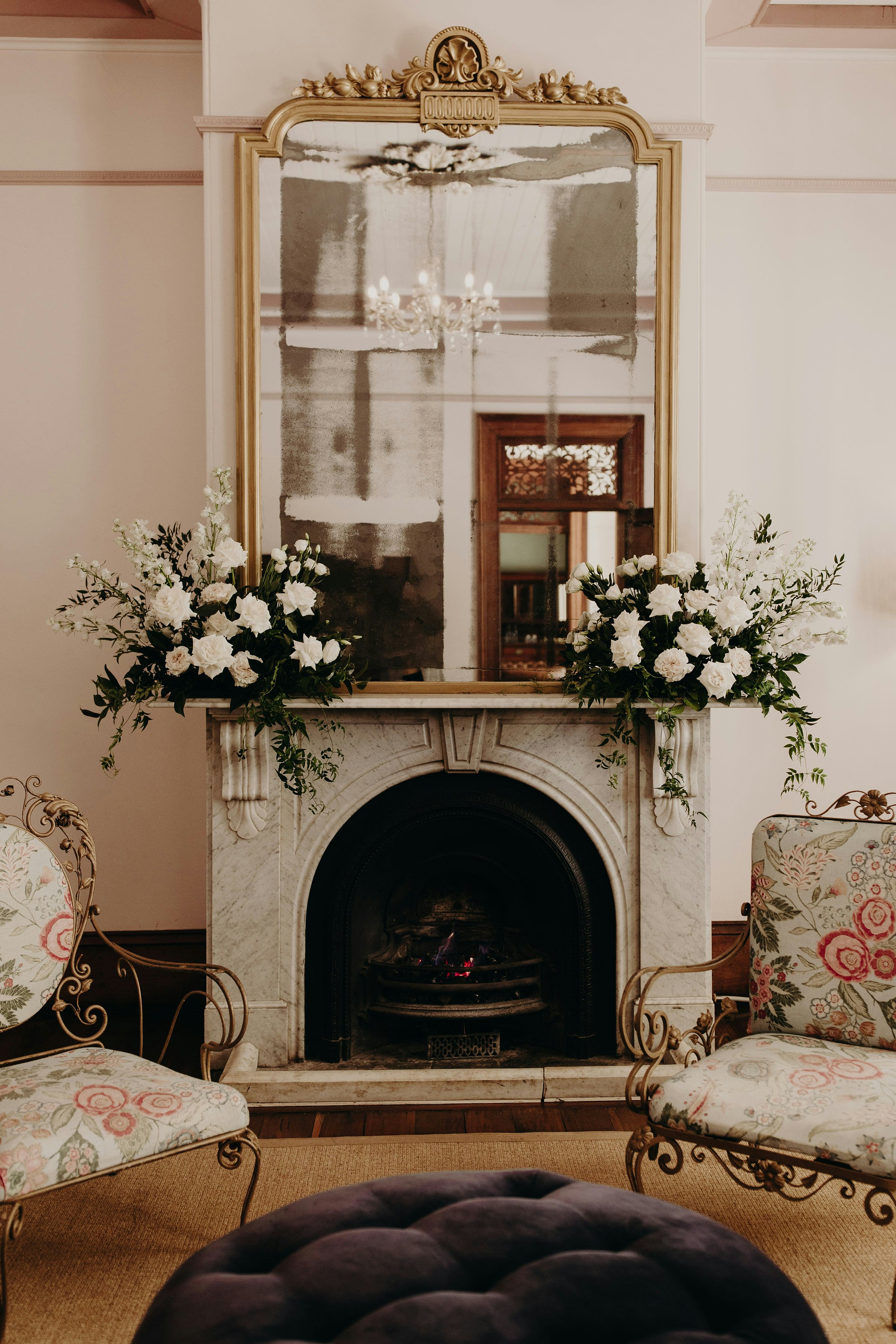 Flowers on a fireplace mantle