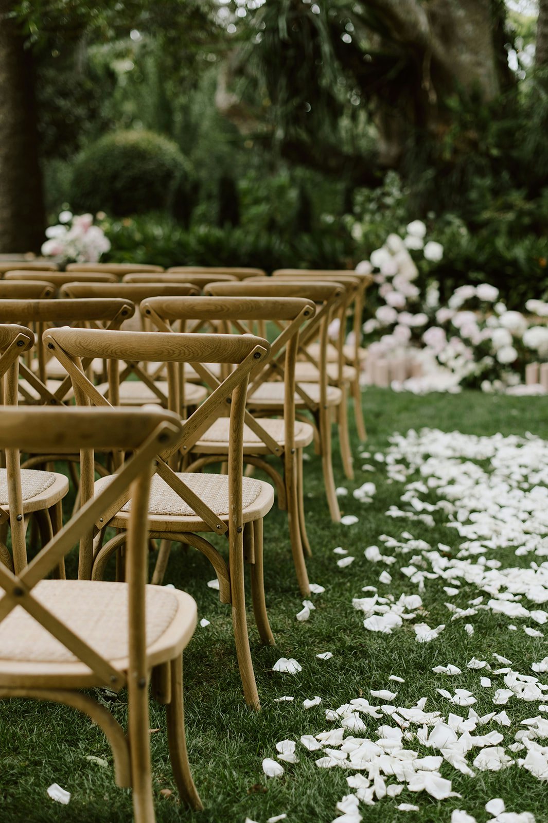 Wooden chairs at ceremony