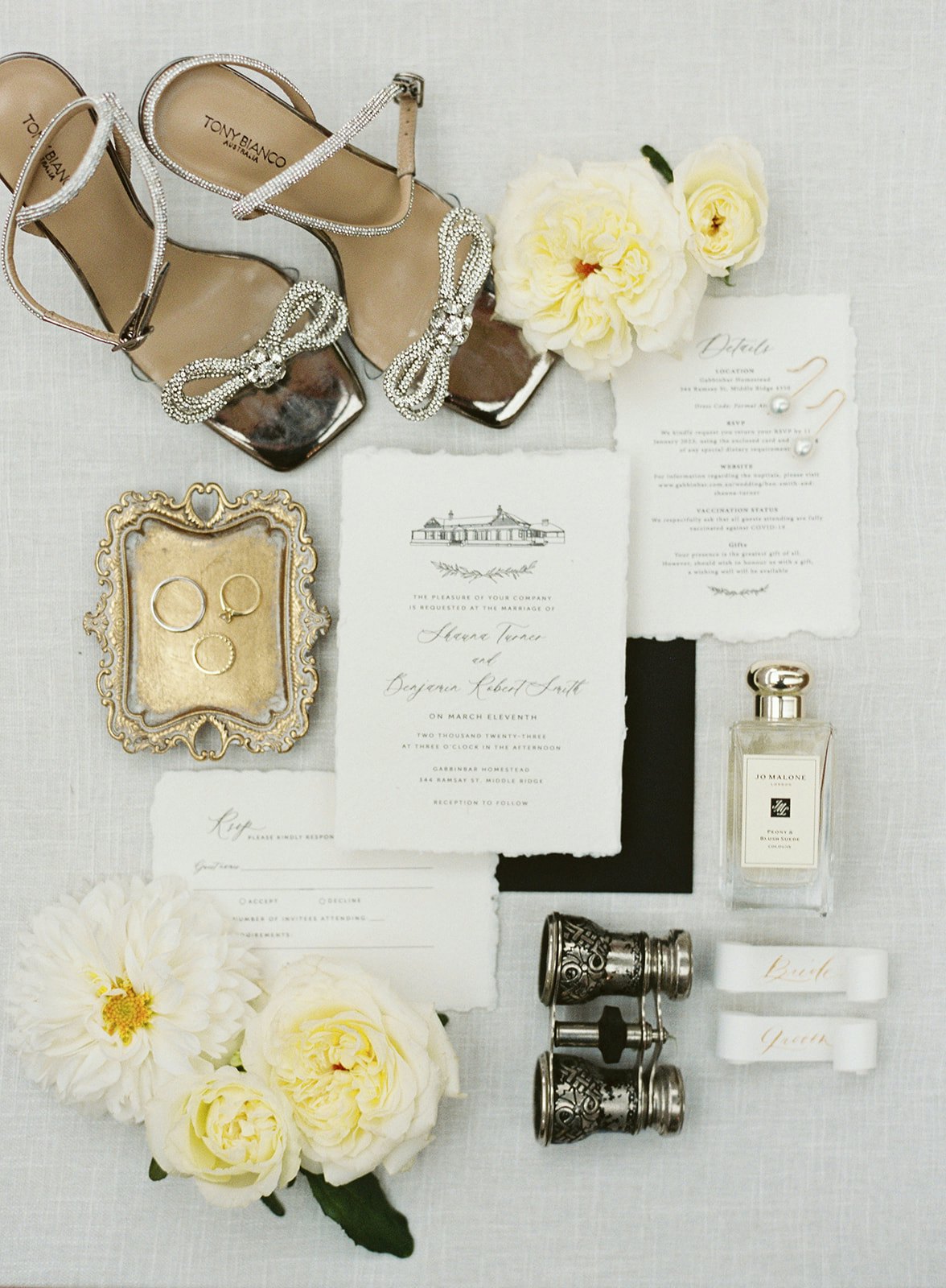 Wedding day shoes, invitation and rings