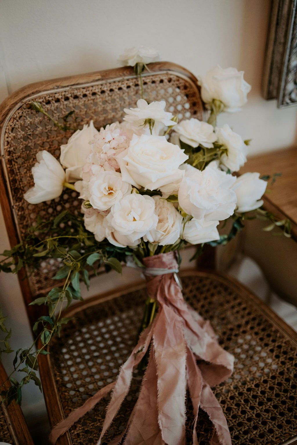 Wedding bouquet sitting on a chair