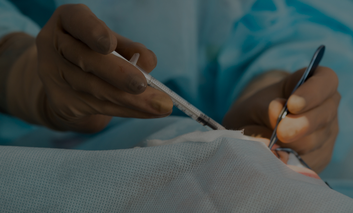 Close up image of doctor performing an eye procedure