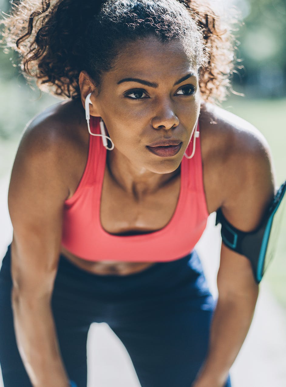 confident woman jogger after women's hormone therapy treatment in Lincoln, NE