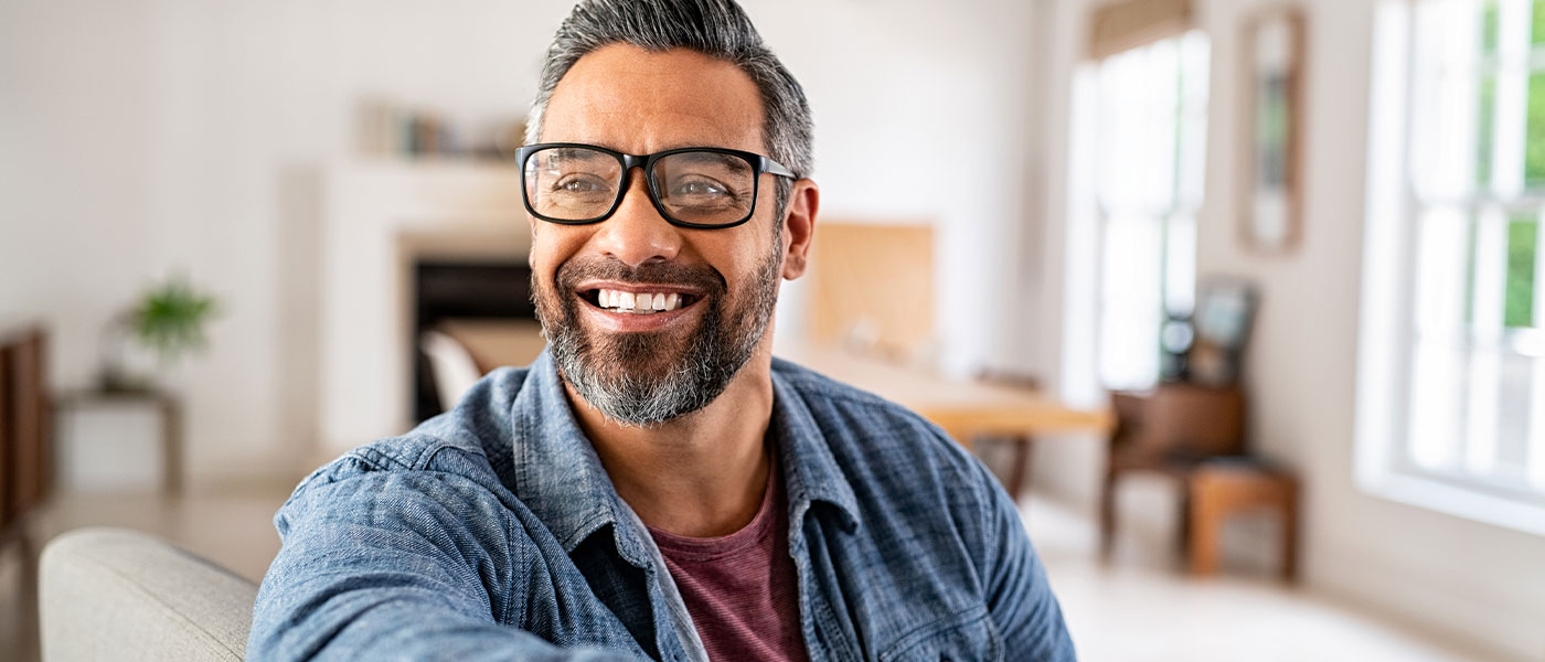 Happy man after HRT treatment from Genesis Lifestyle Medicine.