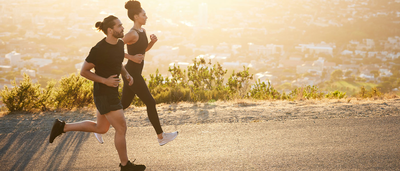 Couple jogging after weight loss program from Genesis Lifestyle Medicine.