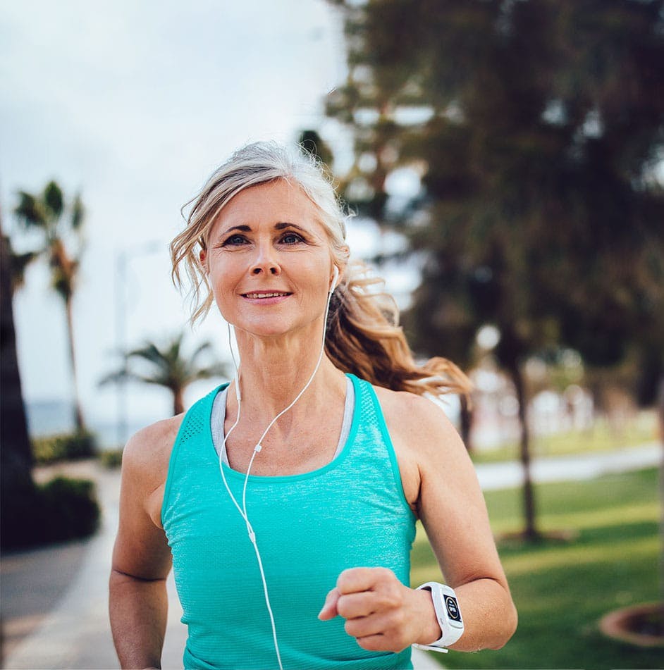 woman running after women's hormone therapy in Cumming