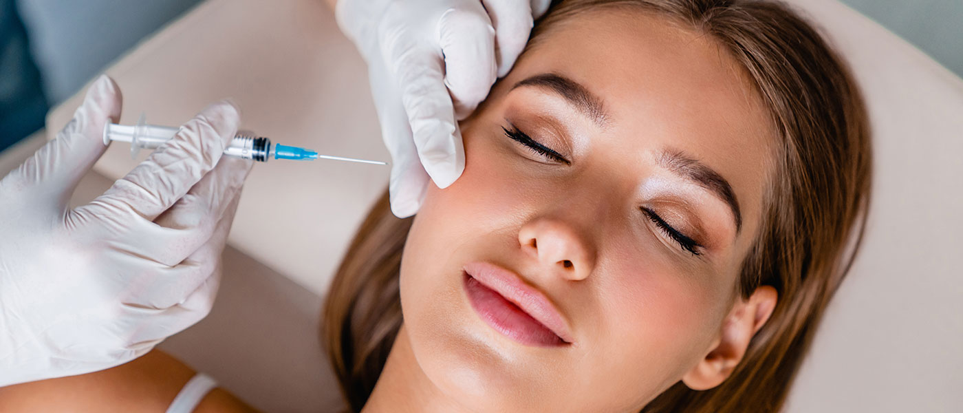 Woman receiving Botox at Genesis Lifestyle Medicine.