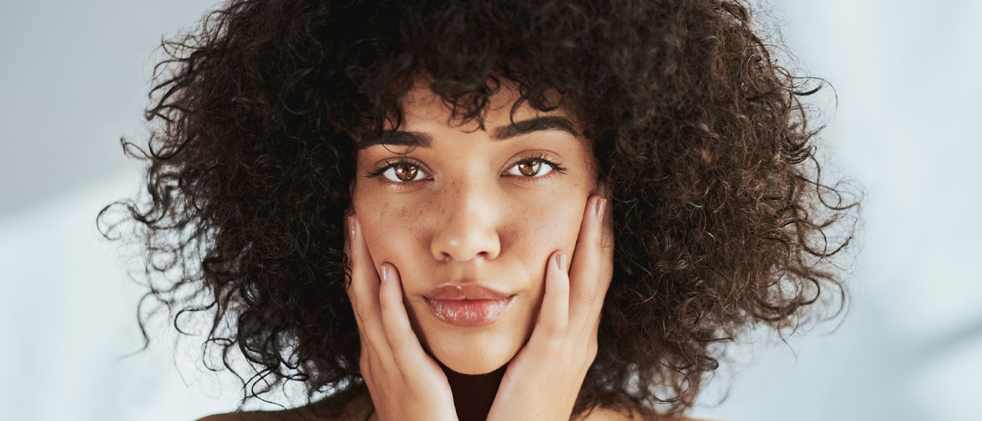 Woman contemplating taking Semaglutide from Genesis Lifestyle Medicine.