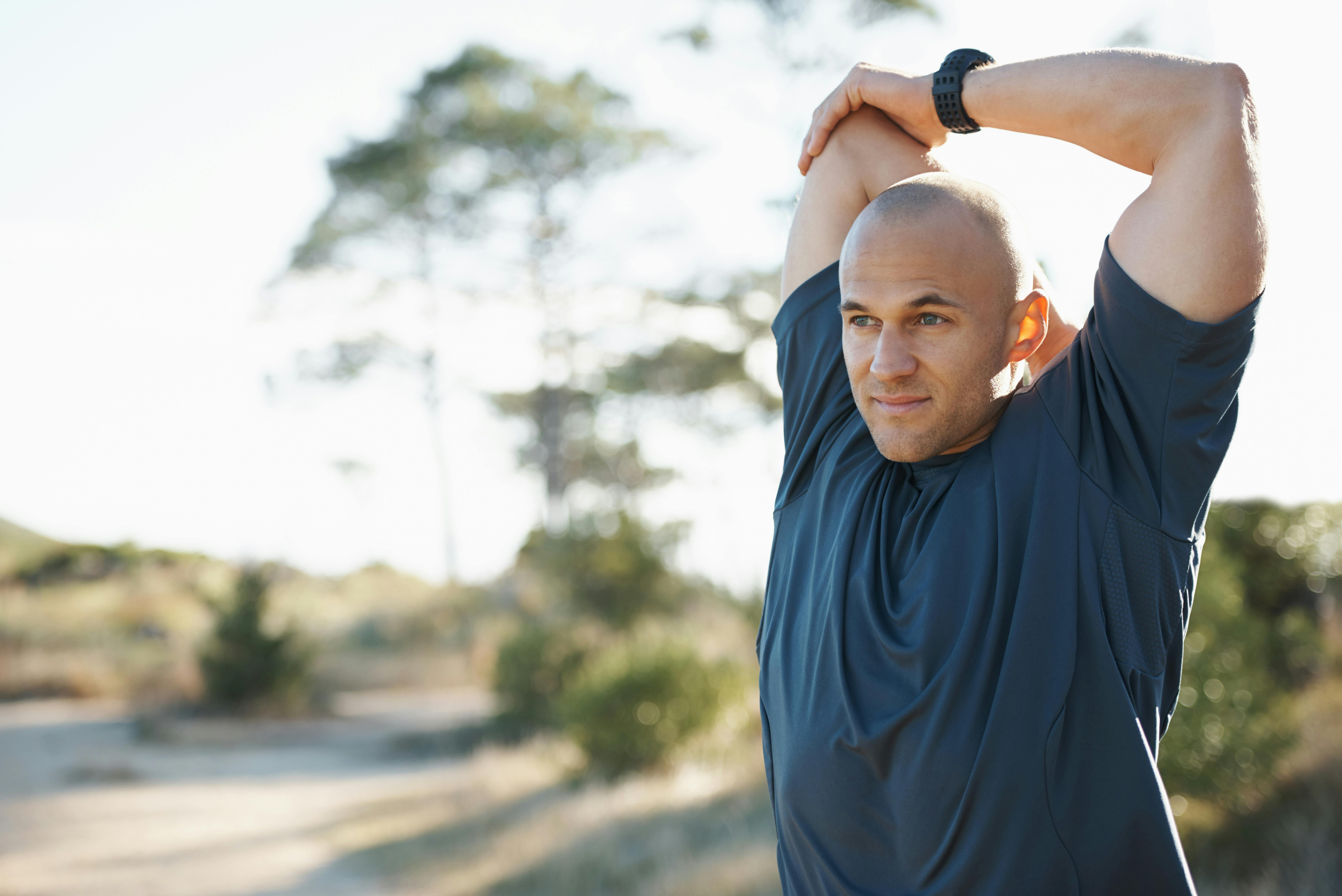 man stretching after weight loss medication in Santa Ana