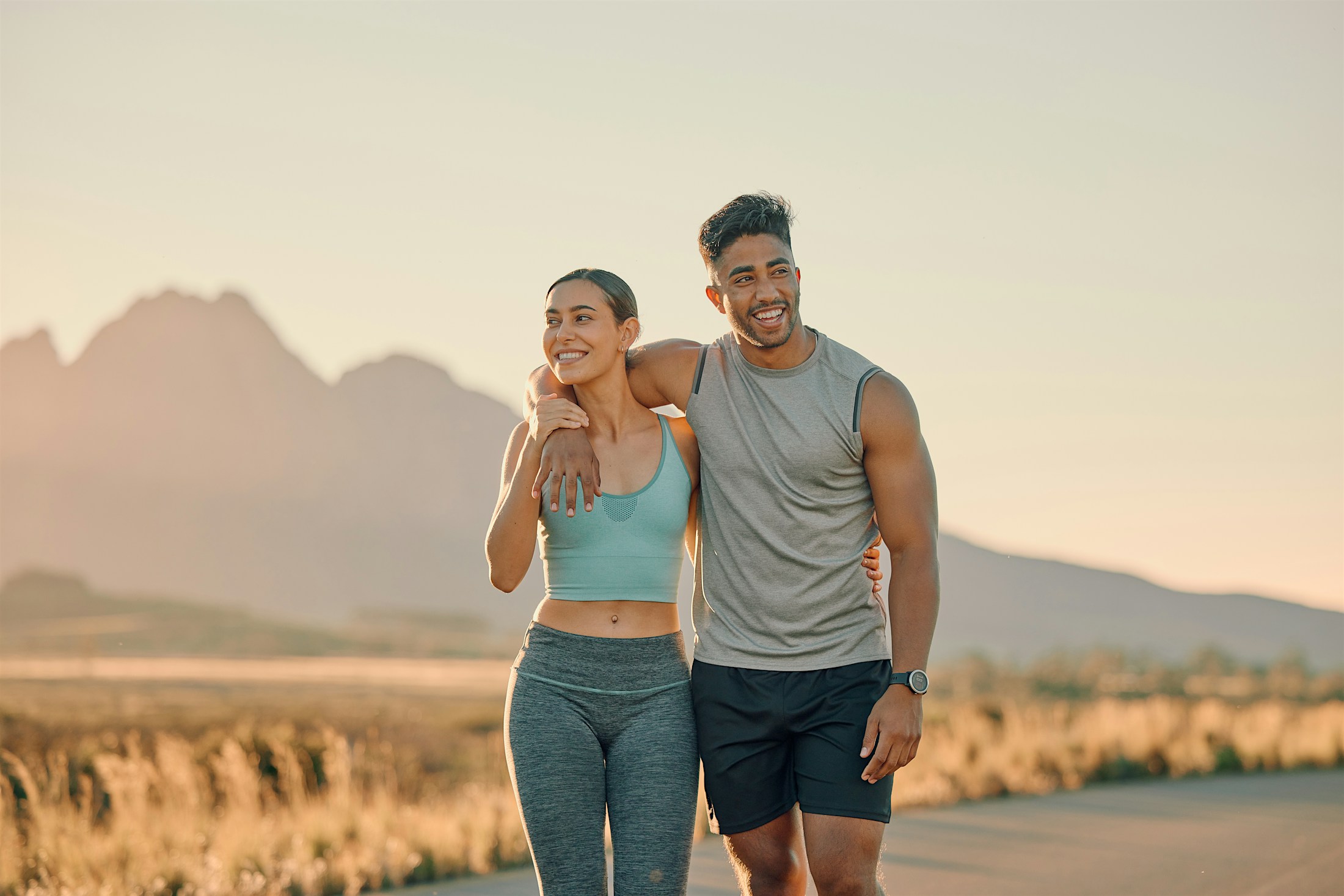 Husbands arm around wife after resolving erectile dysfunction in Las Vegas.
