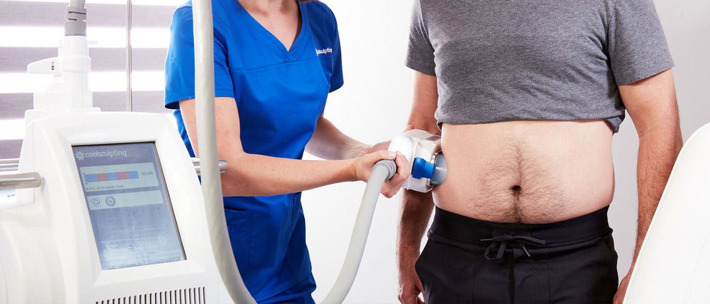 Man receiving CoolSculpting at Genesis Lifestyle Medicine. 