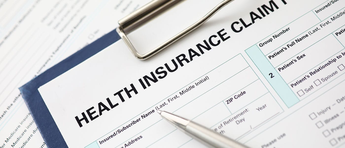 Health insurance form depicted by Genesis Lifestyle Medicine.