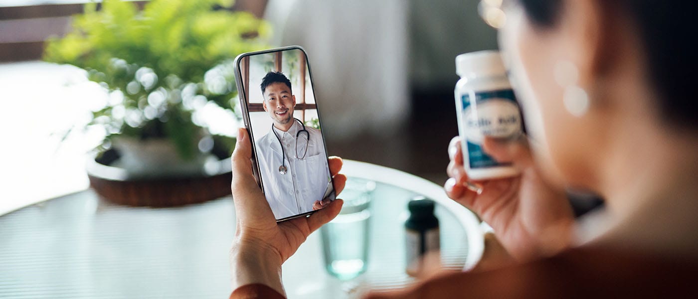 Woman on a telehealth call with a Genesis Lifestyle Medicine Doctor.