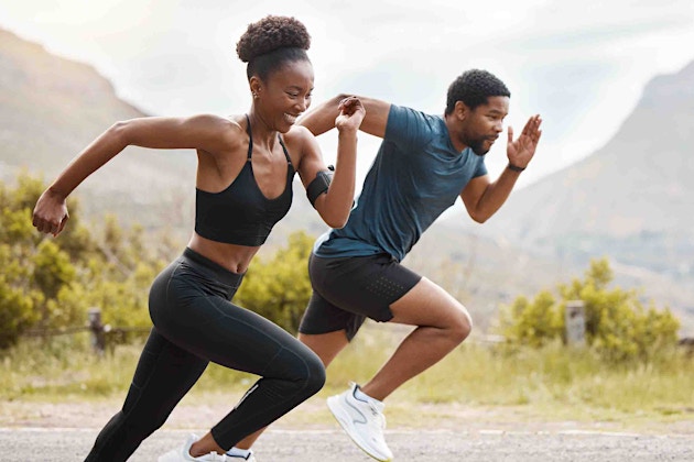 Couple doing a HIIT workout after ED treatment from Genesis Lifestyle Medicine.