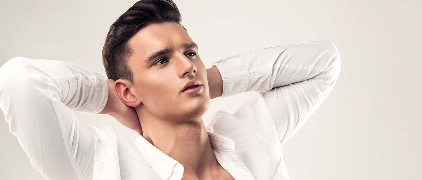 Man with thick, strong hair showing results of PRP therapy at Genesis Lifestyle Medicine.