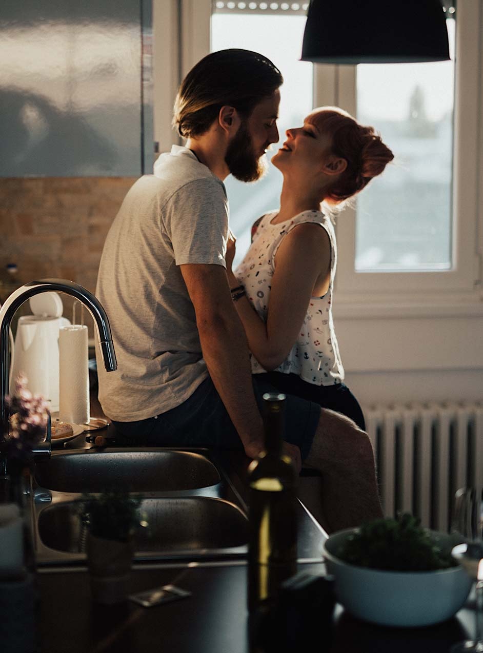 passionate couple in kitchen after erectile dysfunction treatment in Indianapolis, IN