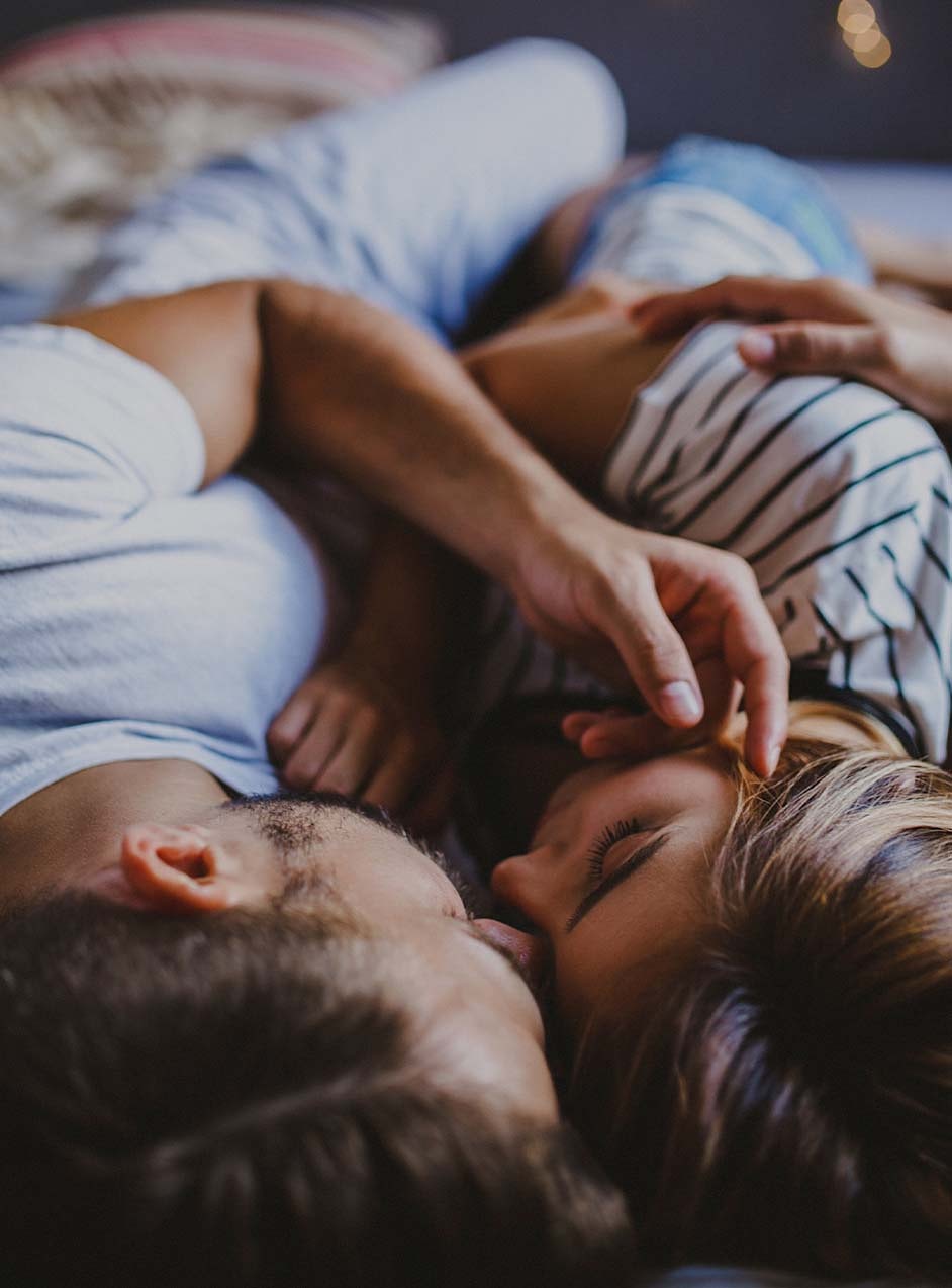 couple in bed after treatment for erectile dysfunction in Dallas, TX