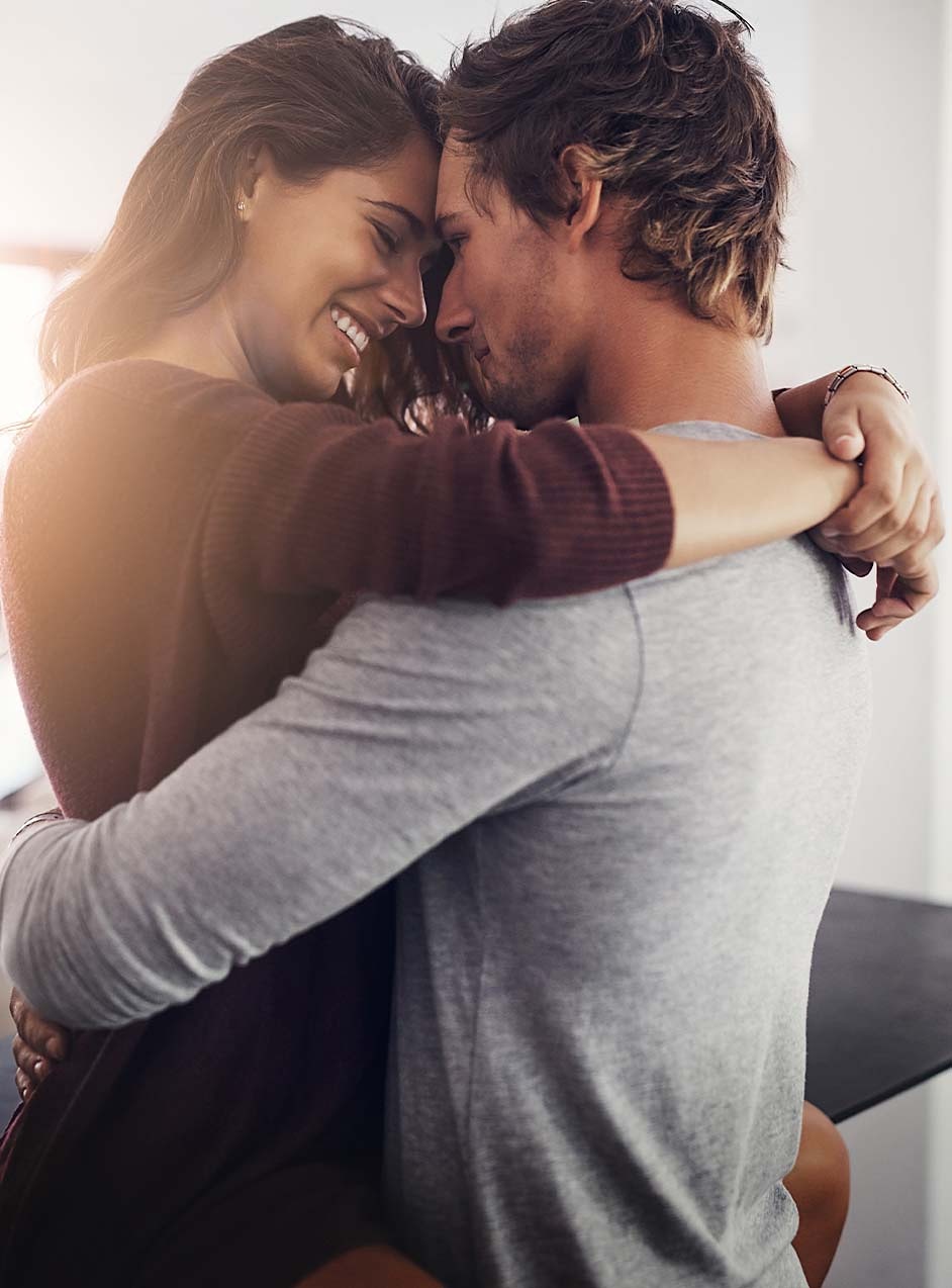 Happy couple hugging after the woman received the O-Shot in Greenwood, IN