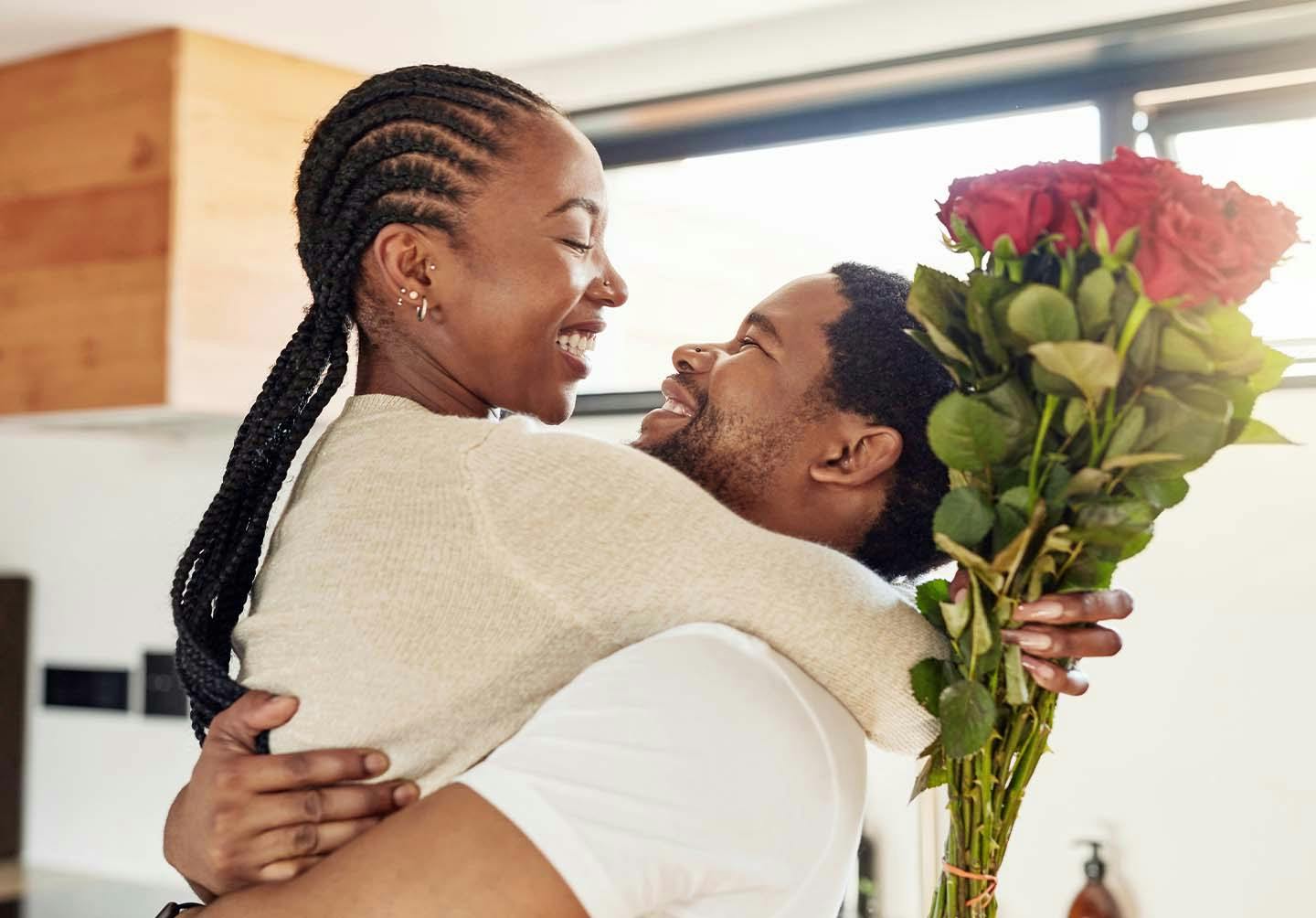 A woman and man hugging after he received P-shot in Pensacola, FL