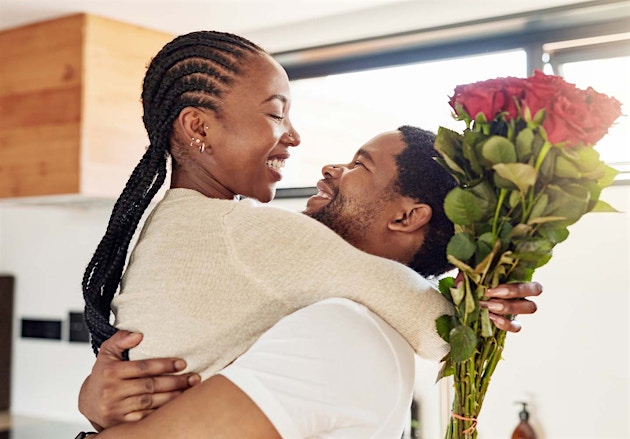 A woman and man hugging after he received P-shot in Pensacola, FL