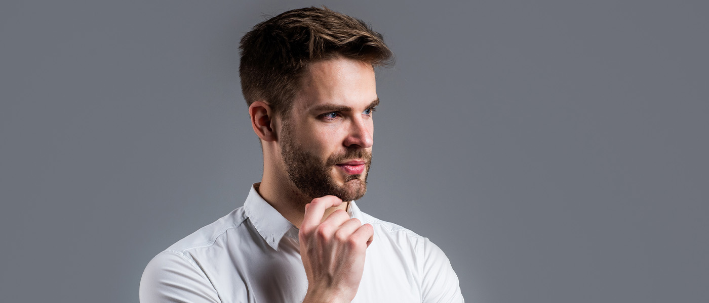man considering hormone therapy at Genesis Lifestyle Medicine