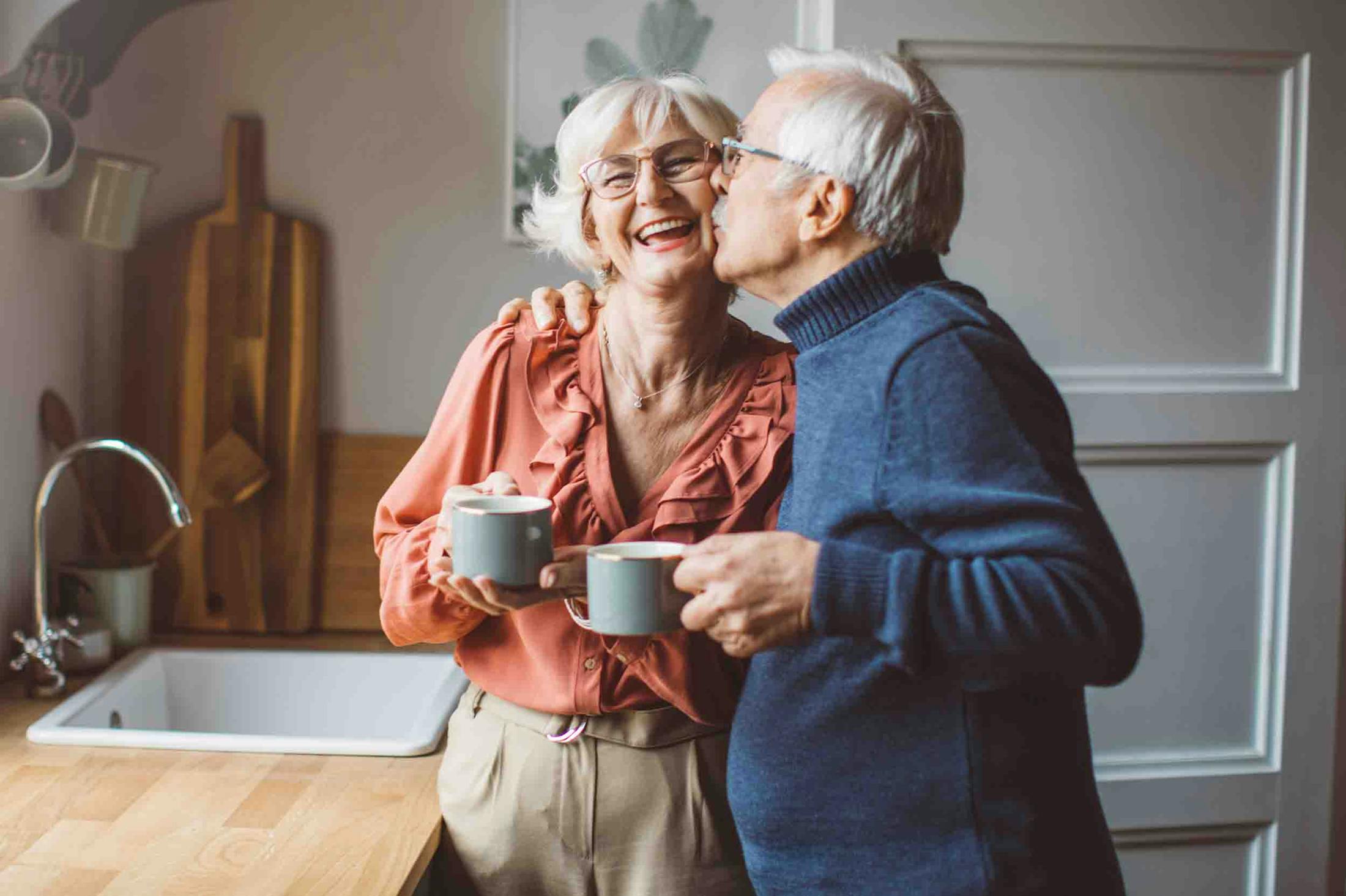 husband kissing happy wife after incontinence treatments in Portland, TX
